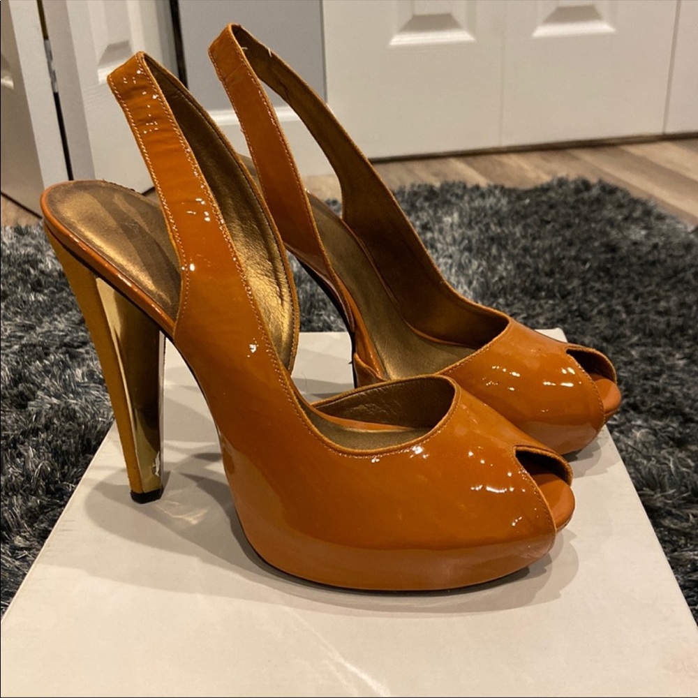 ALDO orange patent sling backs
